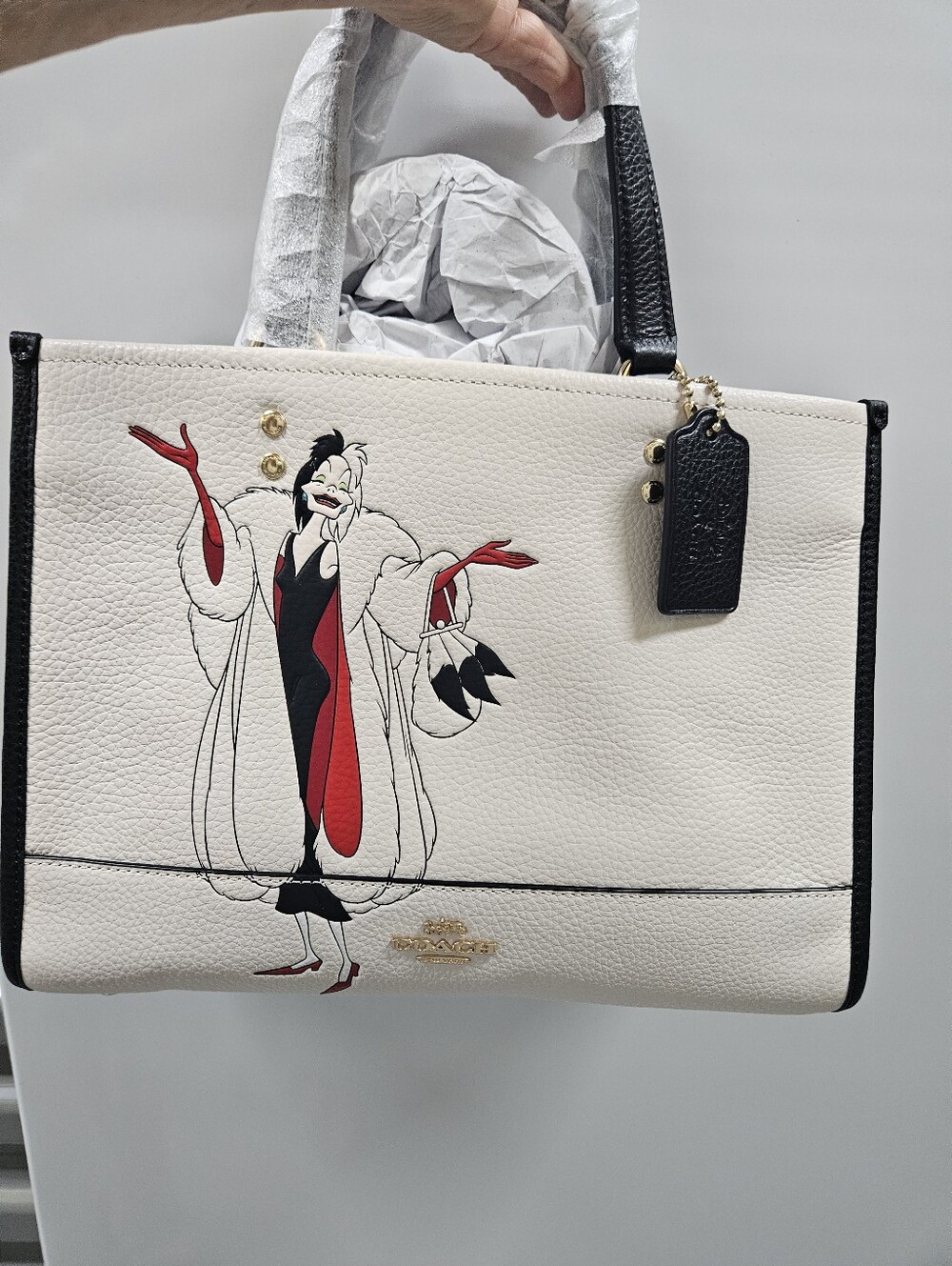 NWT Disney Coach Cream Leather Tote with Cruella Red and Black Accents